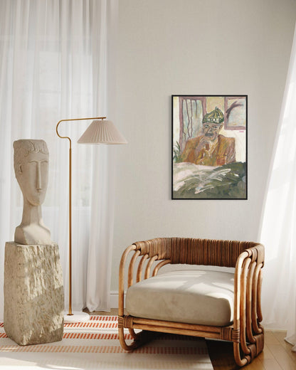Modern interior with a wicker chair, sculpture, lamp, and wall art.