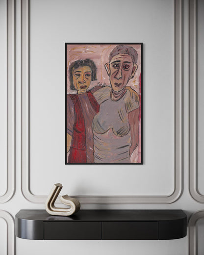 Framed artwork of two people on a wall above a black console table with a decorative object.