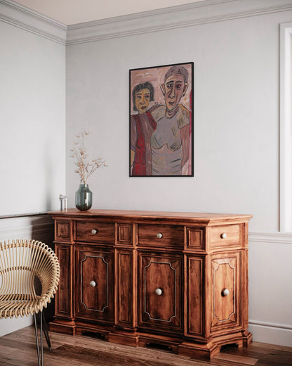 Wooden sideboard in a room with a painting on the wall