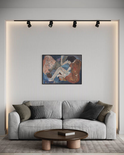 Gray sofa in a living room with a painting on the wall and a wooden coffee table.