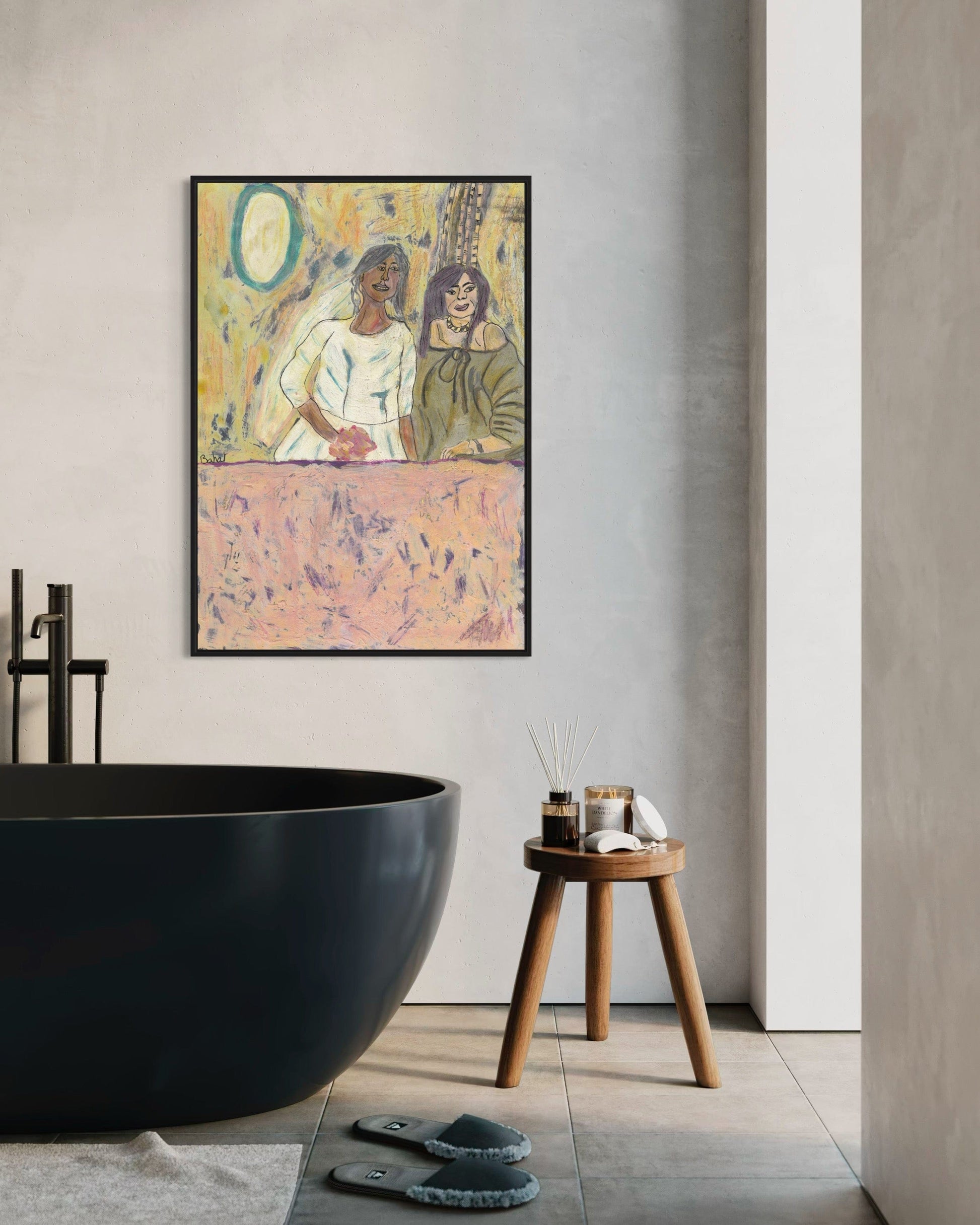 Modern bathroom interior with a large black freestanding bathtub, wooden stool, and abstract art on the wall.