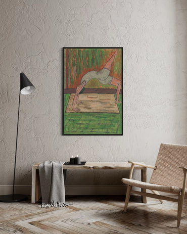 Framed abstract painting on a wall above a wooden table with a chair and lamp in a room.