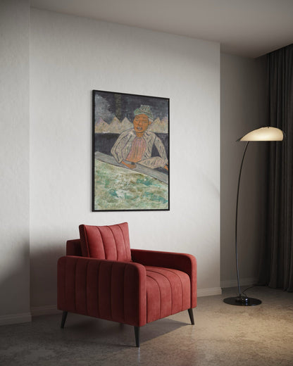 Red armchair in a room with a framed artwork on the wall and a floor lamp.