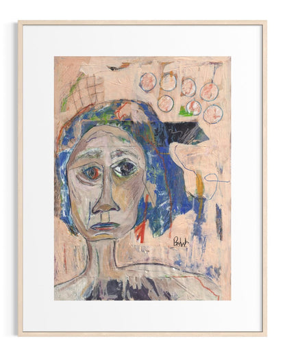 Framed abstract artwork with a face-like figure on a beige background