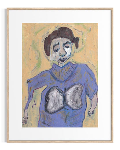 Framed artwork of a person wearing a blue sweater with a large round object on it, against a beige background.