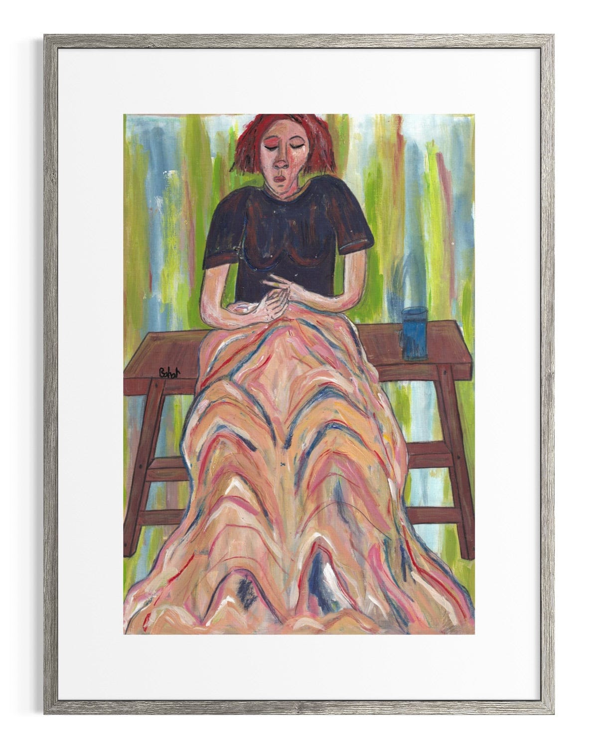 Framed artwork of a woman sitting on a bench with a colorful dress.
