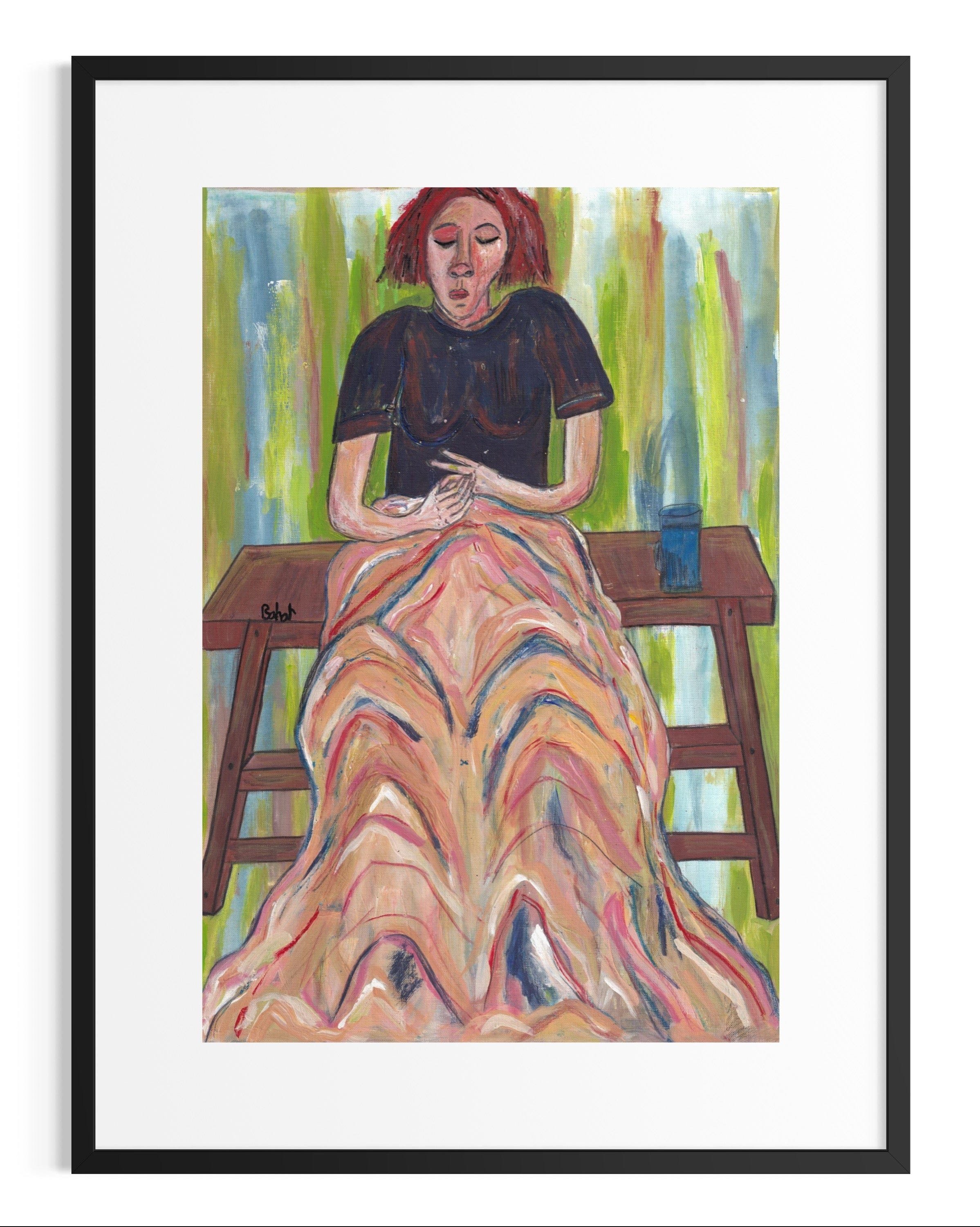 Framed artwork of a woman sitting on a bench with a colorful dress.