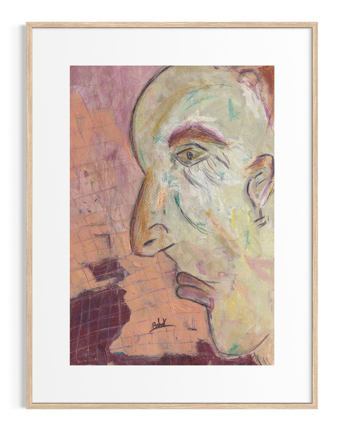 Framed artwork of a stylized face with abstract colors on a white background