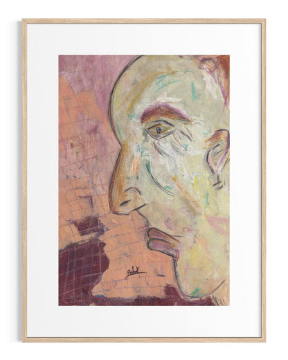 Framed artwork of a stylized face with abstract colors on a white background